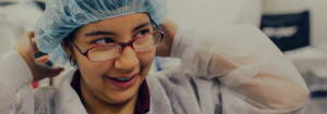 A young worker working in a factory.