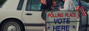 An image of a voter with disabilities received assistance with curbside voting.