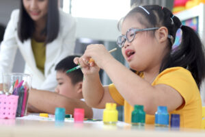 Disabled kids classroom, children having fun during study at school