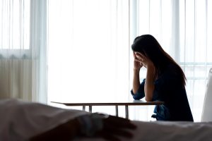 Women strain and worried for her friend in bed health condition in hospital room and Medical treatment, healthcare, family and love concept.